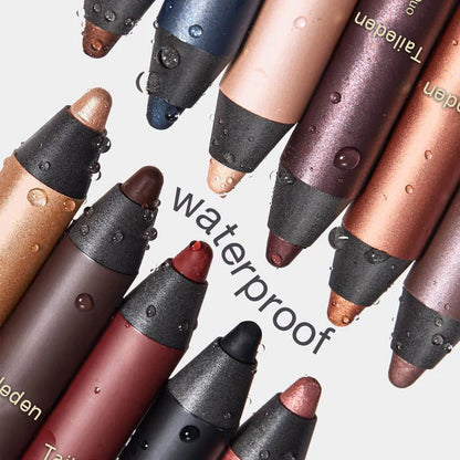 Set of waterproof lip crayons with visible brand name on a light background
